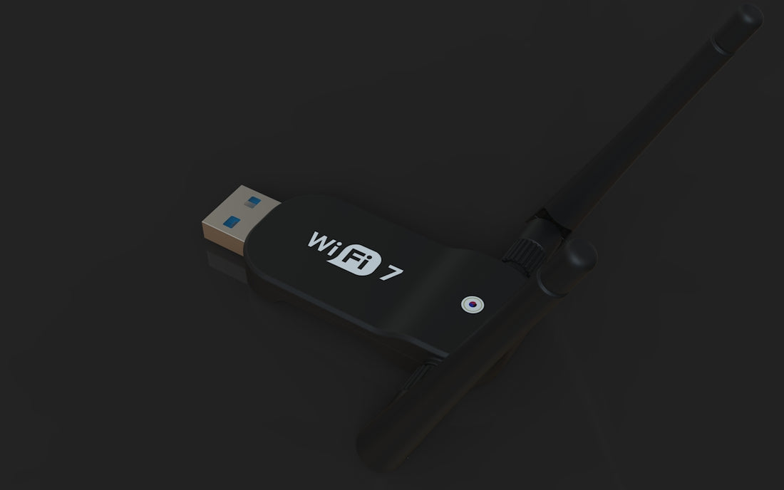 A black usb wifi 7 adapter with an antenna.